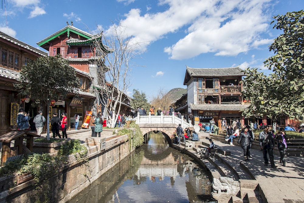 Lijiang’s Old Town is a UNESCO World Heritage Site known for its wooden architecture and winding canals 